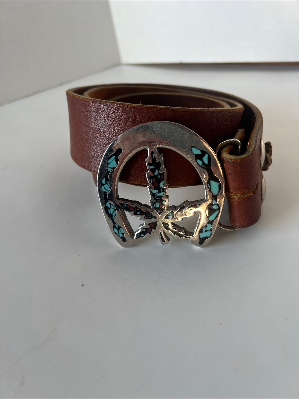Vintage belt w pot leaf motif buckle